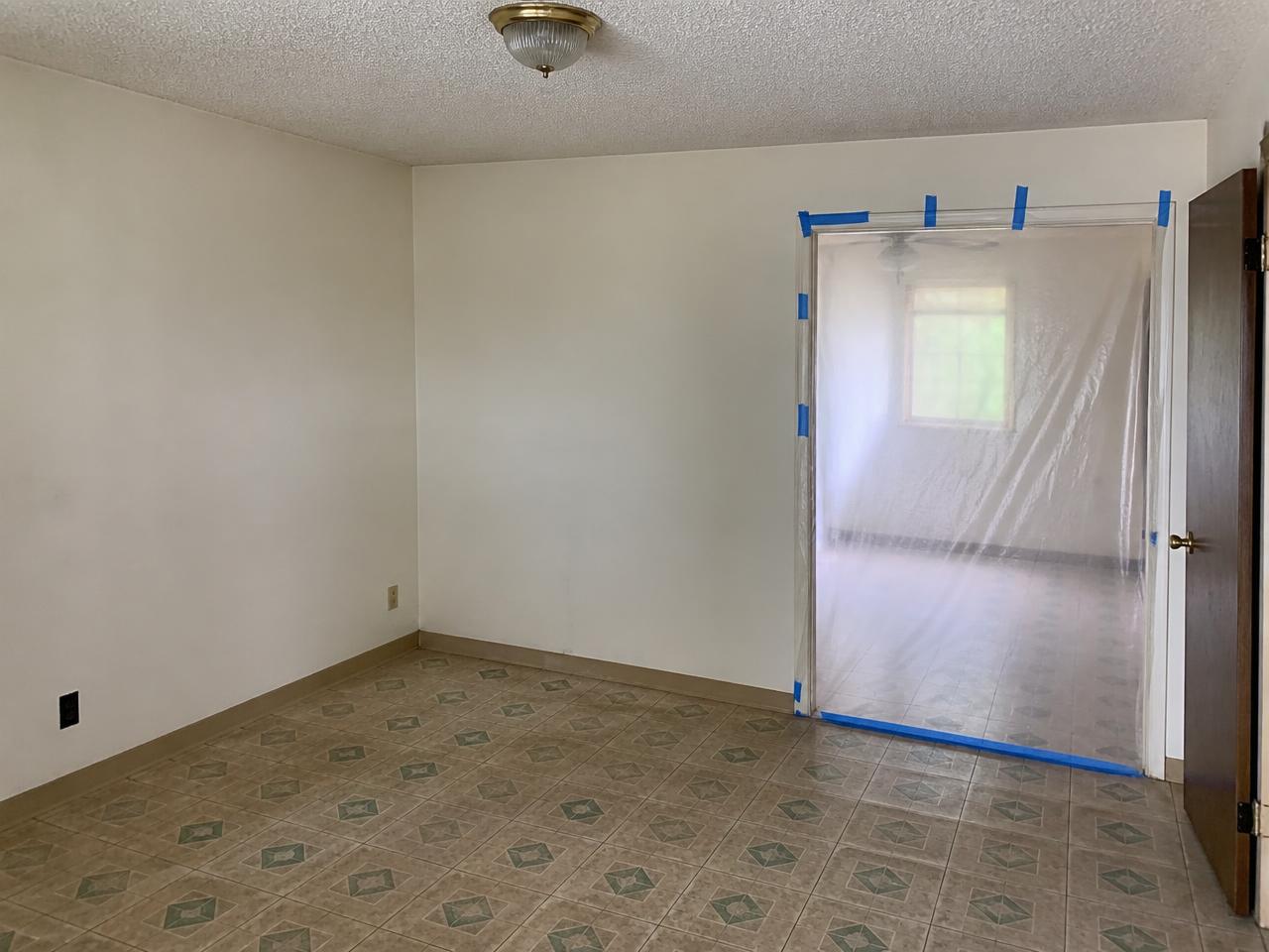 Aged textured ceiling containing regulated material before abatement