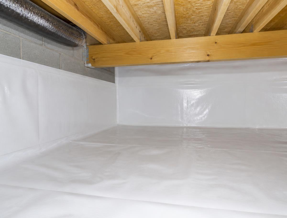 Clean dry crawl space with new vapor barrier after mold remediation