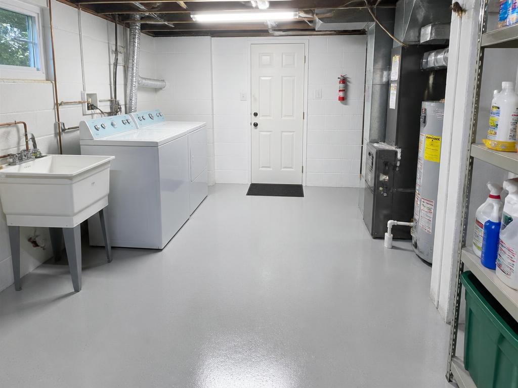 Clean sanitized utility room with sealed floor after cleanup